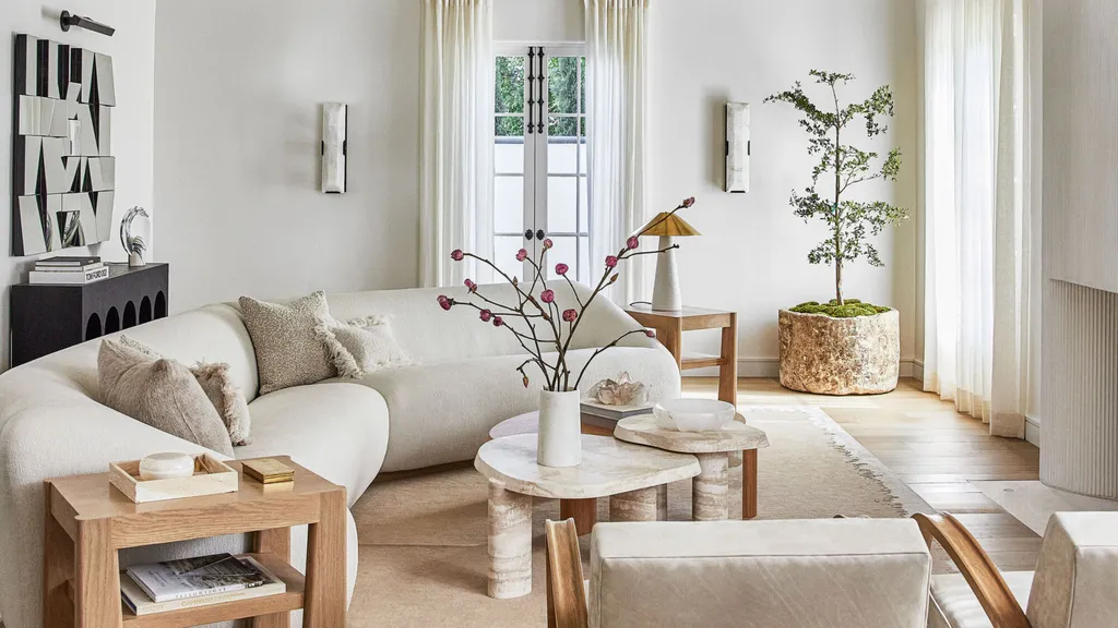 Neutrally decorated bedroom with natural light staged for a home sale
