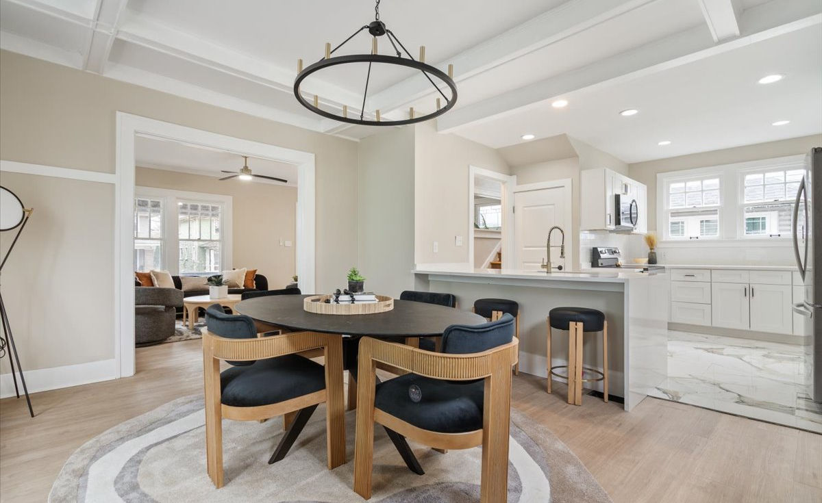 Renovated kitchen and dining room in a Mad River Homes property
